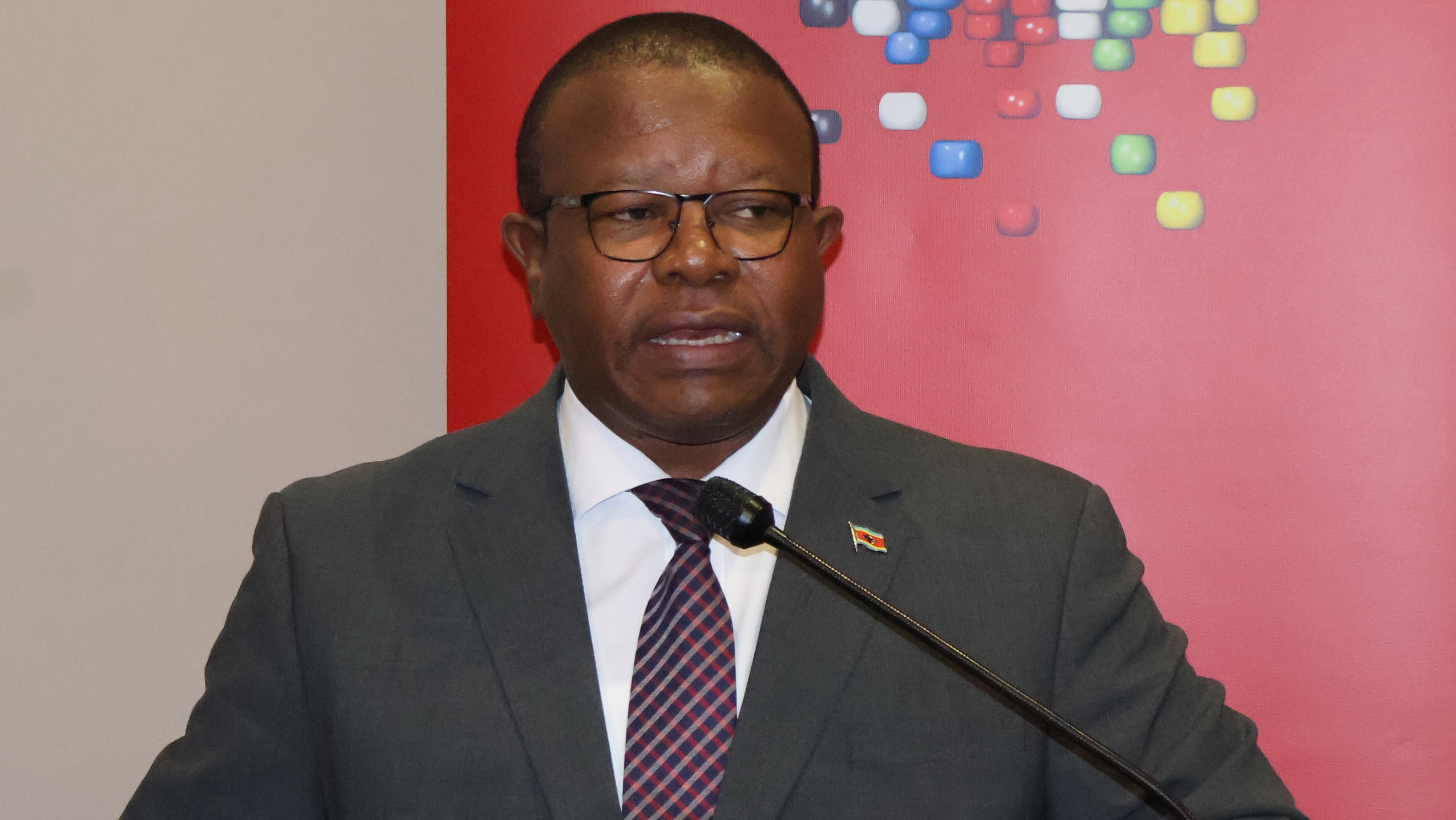 Minister for Commerce, Industry and Trade Manqoba Khumalo, introducing the PM. 